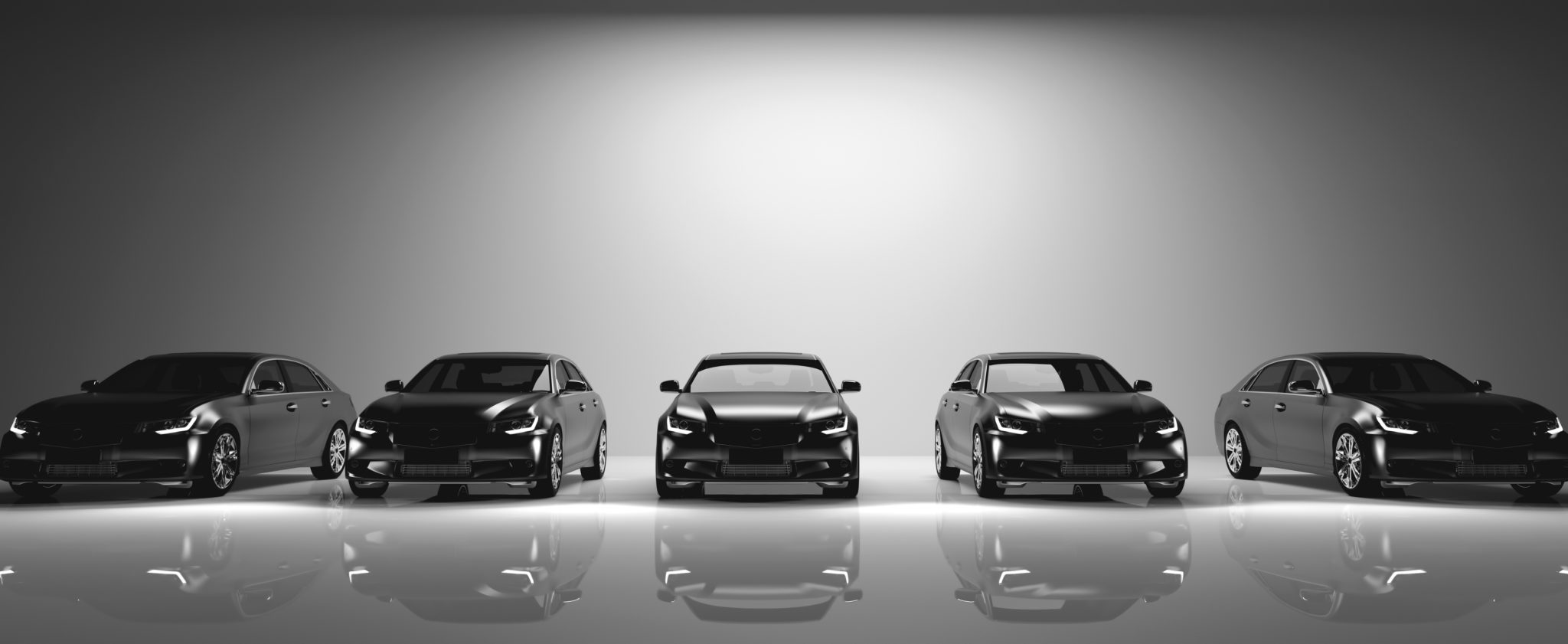 Fleet of black cars on light background to illustrate manufacturers recommendations and vehicle maintenance